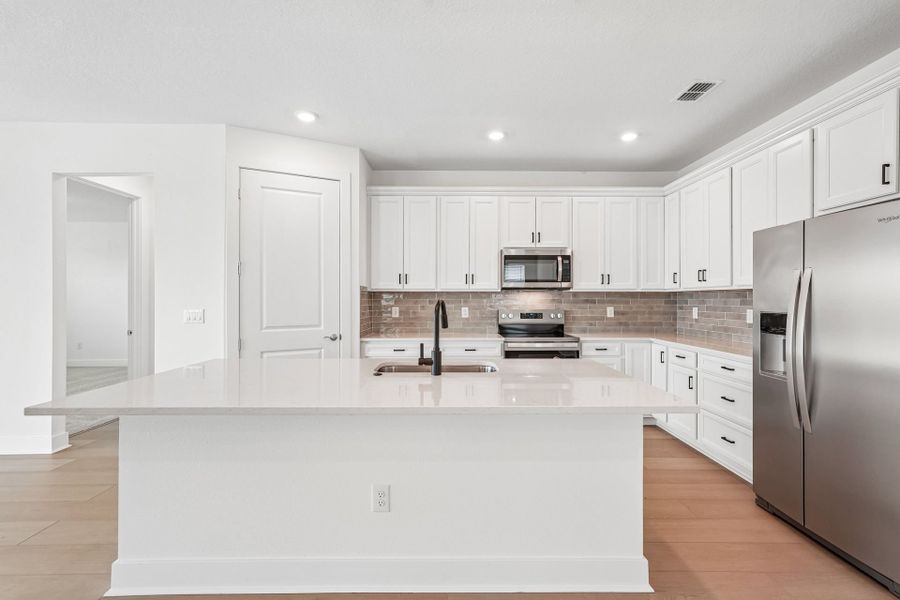 Furnished interior view inside a new home in Seaire, Parrish (Image 7).
