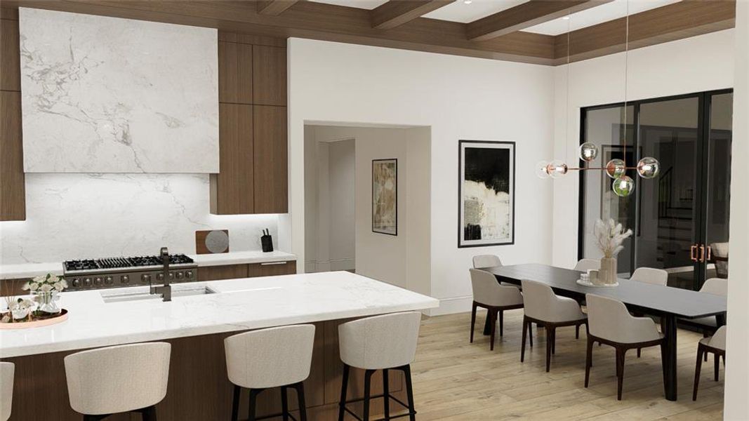 Tastefully designed breakfast room with ceiling lined in wood beams expanding to the kitchen.