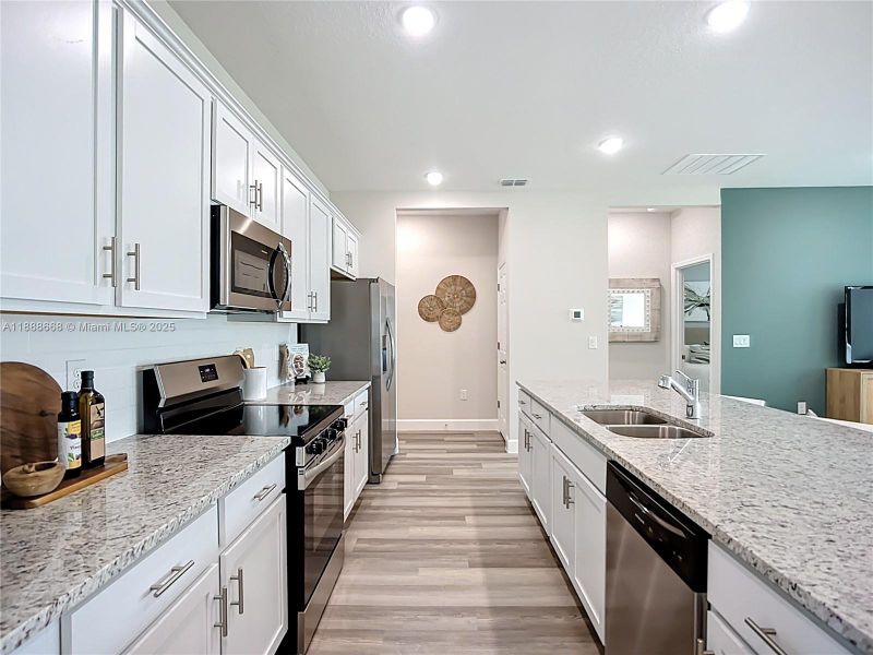 Furnished interior view inside a new home in , North Port (Image 3).