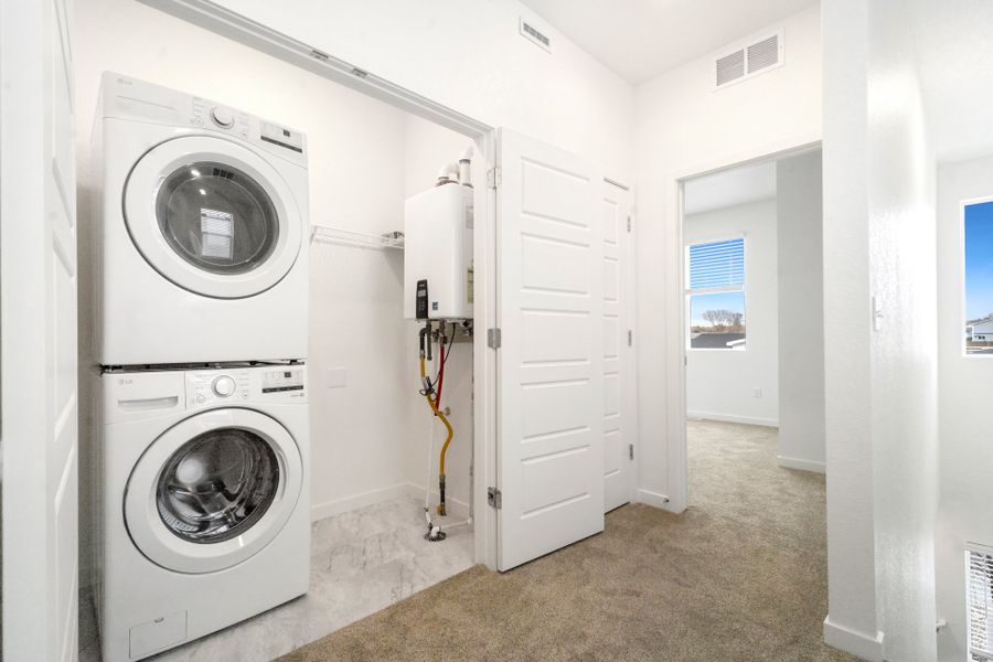 Representative exterior photo of a completed home built from the Telluride by Baessler Homes in Liberty Draw, Evans, CO (Image 23).