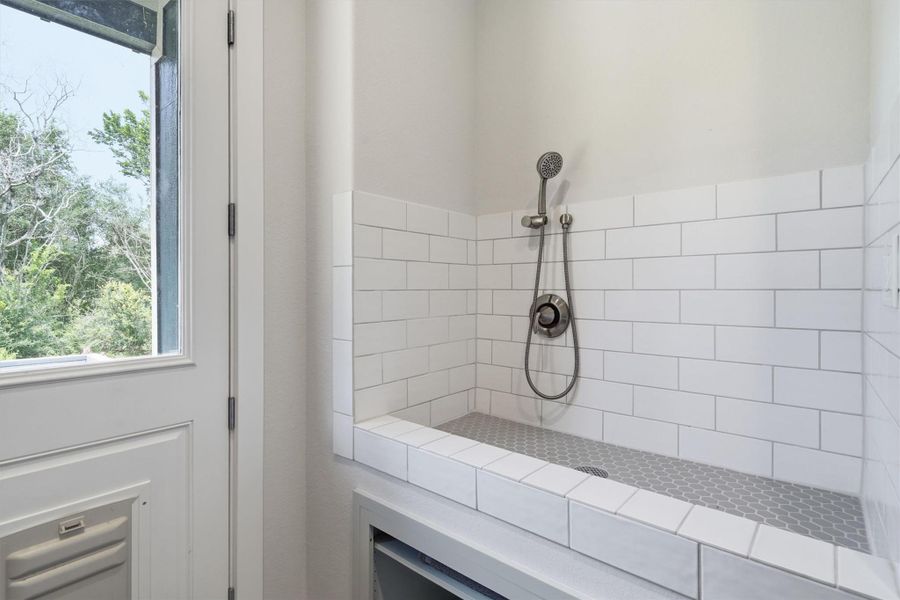 Fully tiled dog wash in the laundry room Fully tiled dog wash in the laundry room