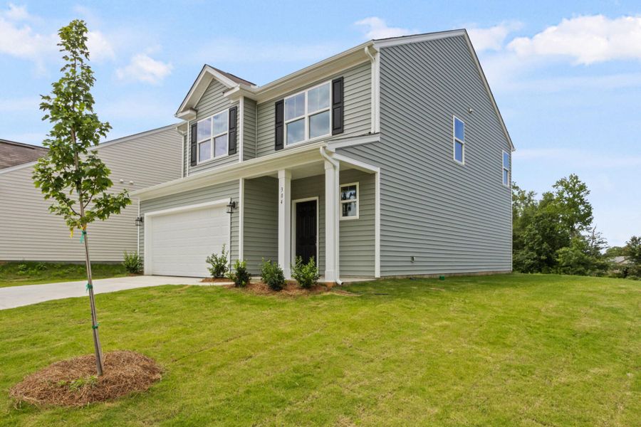 Front exterior of a new home in Bellevue, Greenville, SC, highlighting curb appeal (Image 2).