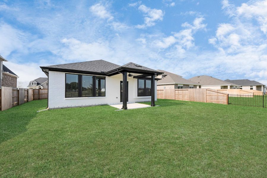 Exterior details and patio area of a home in Arabella on the Prairie: Premier Collection, Richmond (Image 3). Exterior details and patio area of a home in Arabella on the Prairie: Premier Collection, Richmond (Image 3).