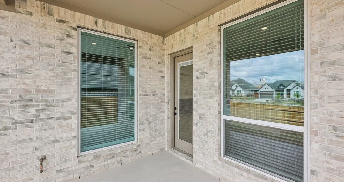 Exterior details and patio area of a home in Sunfield, Buda (Image 14). Exterior details and patio area of a home in Sunfield, Buda (Image 14).
