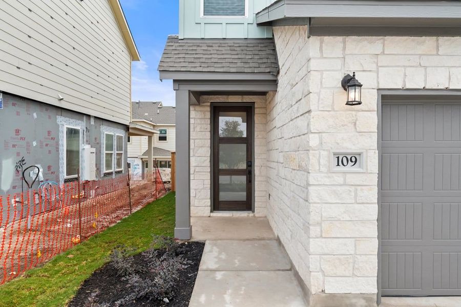 Exterior details and patio area of a home in Union Collection at Park Central, Georgetown (Image 3).