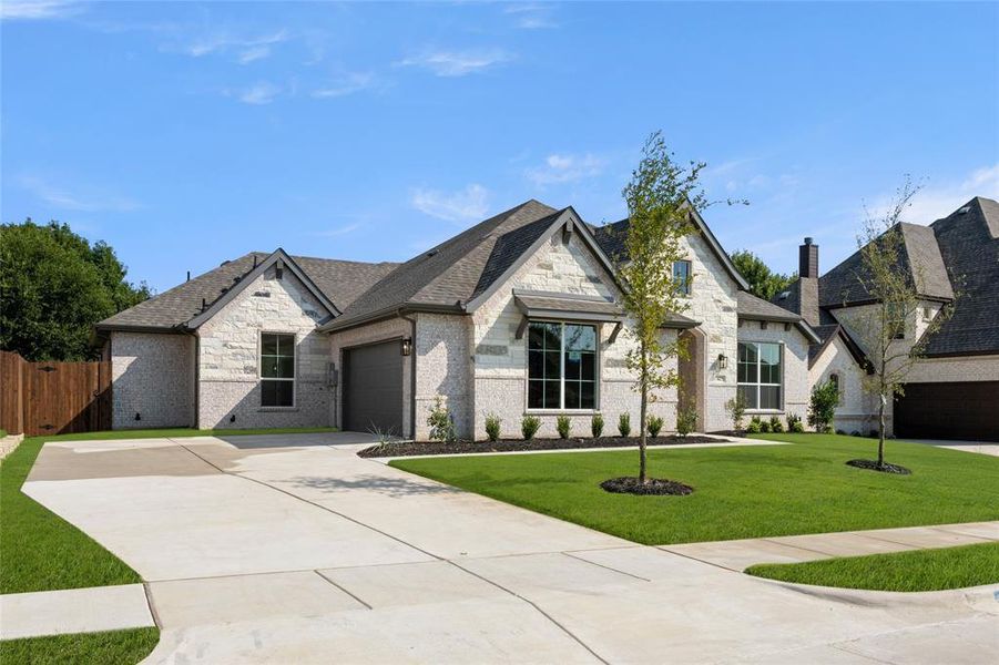 Front exterior of a new home in Massey Meadows, Midlothian, TX, highlighting curb appeal (Image 21). Front exterior of a new home in Massey Meadows, Midlothian, TX, highlighting curb appeal (Image 21).