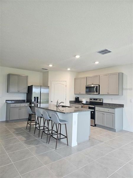 Furnished interior view inside a new home in , Haines City (Image 5).