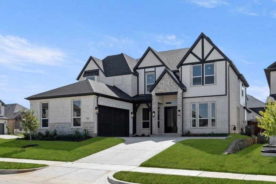 Front exterior of a new home in Birdsong, Mansfield, TX, highlighting curb appeal (Image 19).
