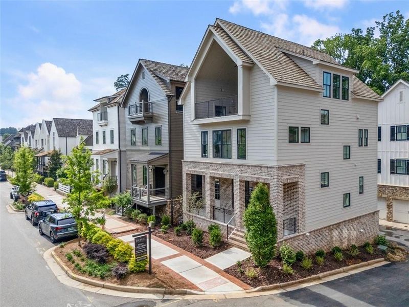 Front exterior of a new home in , Alpharetta, GA, highlighting curb appeal (Image 28). Front exterior of a new home in , Alpharetta, GA, highlighting curb appeal (Image 28).