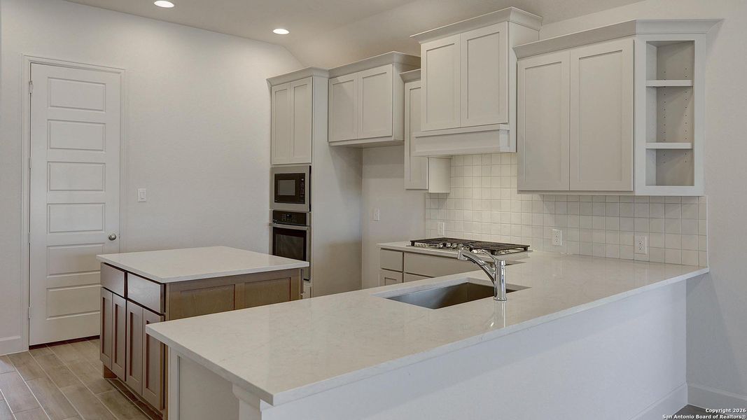 Furnished interior view inside a new home in Ladera 45', San Antonio (Image 16).