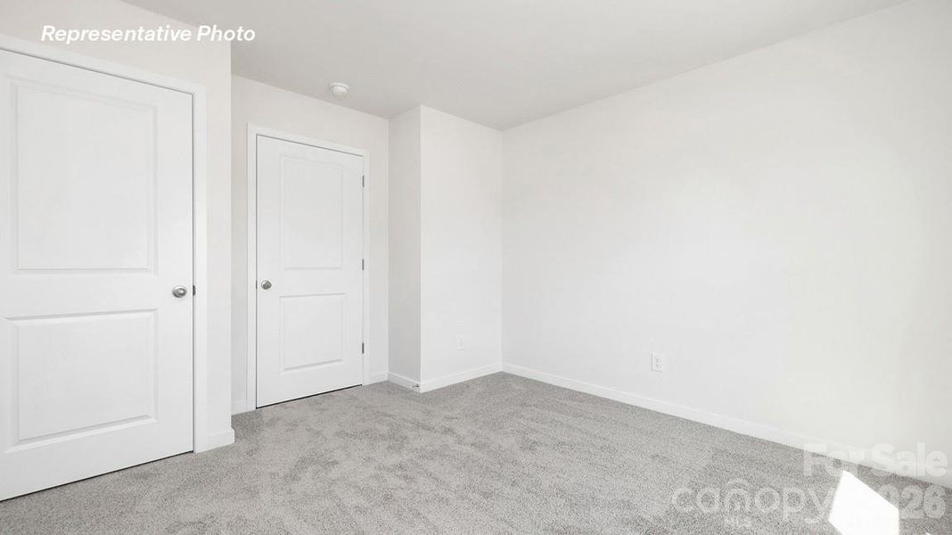 Spacious, unfurnished interior of a new home in Reedy Creek Preserve, Charlotte (Image 18).