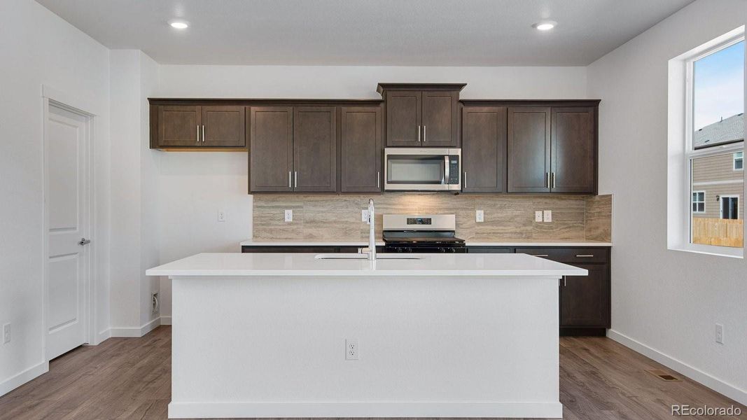 Furnished interior view inside a new home in Sky Ranch, Watkins (Image 3).