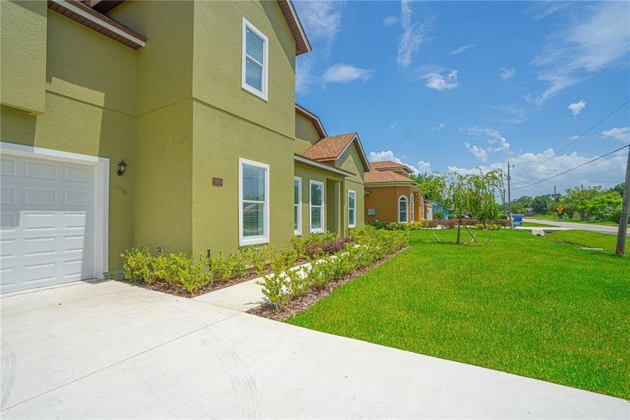 Front exterior of a new home in , Sanford, FL, highlighting curb appeal (Image 2).