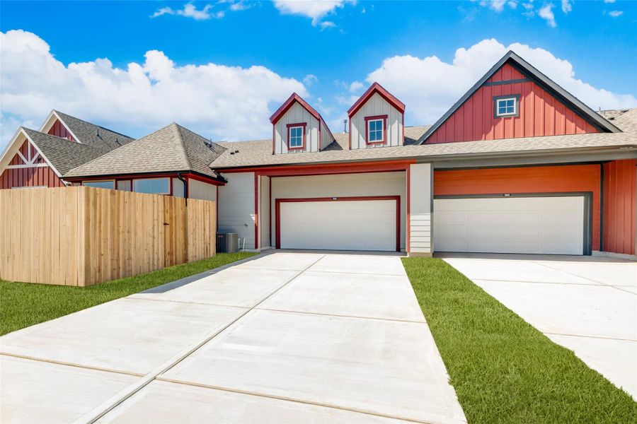 Front exterior of a new home in , Sealy, TX, highlighting curb appeal (Image 13).