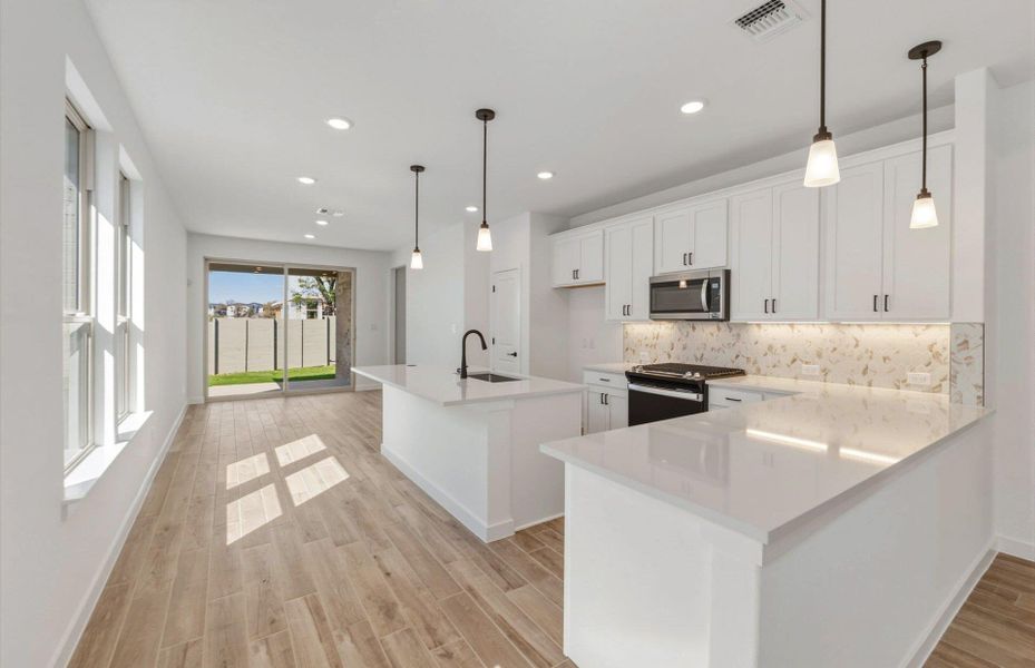 Furnished interior view inside a new home in Wolf Ranch, Georgetown (Image 6).