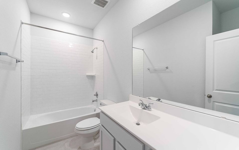 Furnished interior view inside a new home in Cielo, Conroe (Image 9).
