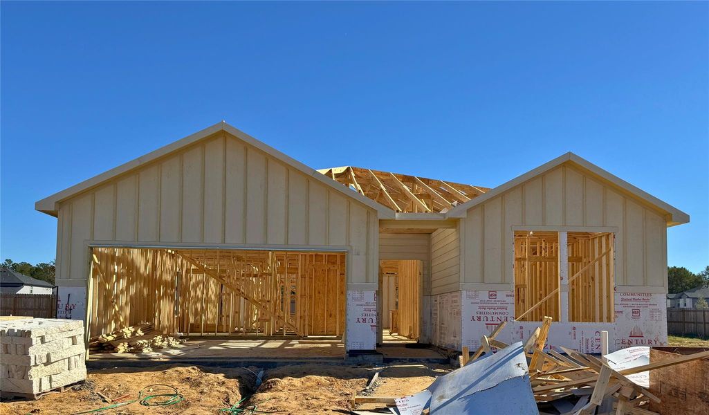 In-progress construction of a new home in Caney Mills, Conroe, TX (Image 18).