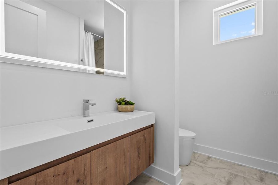 Furnished interior view inside a new home in , Sarasota (Image 9). Furnished interior view inside a new home in , Sarasota (Image 9).