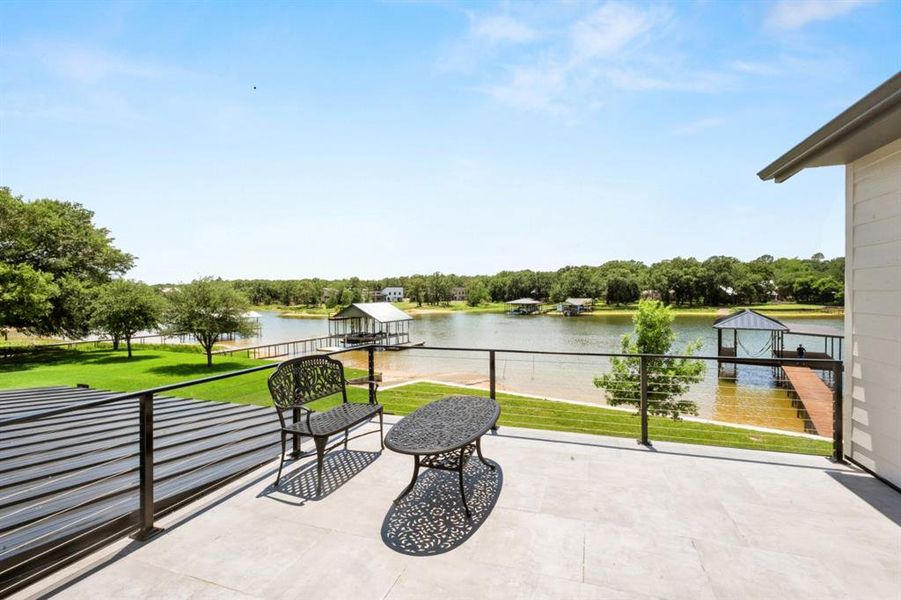 2nd floor outdoor patio off the upstairs primary ensuite & family room.