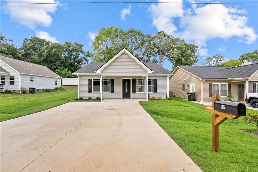 Representative exterior photo of a completed home built from the Lyman by Enchanted Homes in Lonesome Dove, San Antonio, TX (Image 21).