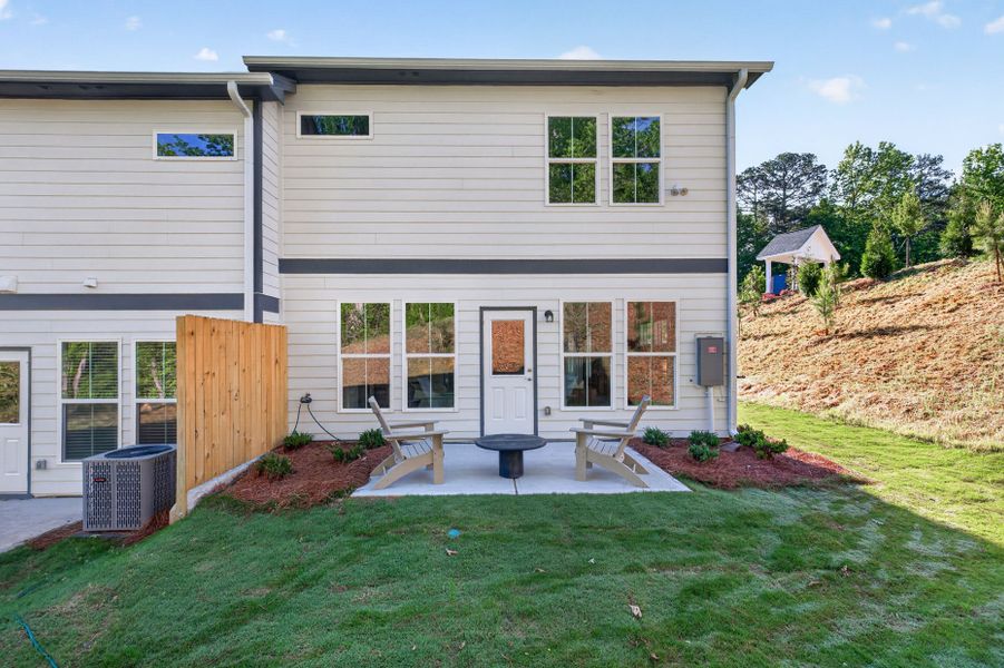Exterior details and patio area of a home in Ansley Towns, Cumming (Image 2). Exterior details and patio area of a home in Ansley Towns, Cumming (Image 2).