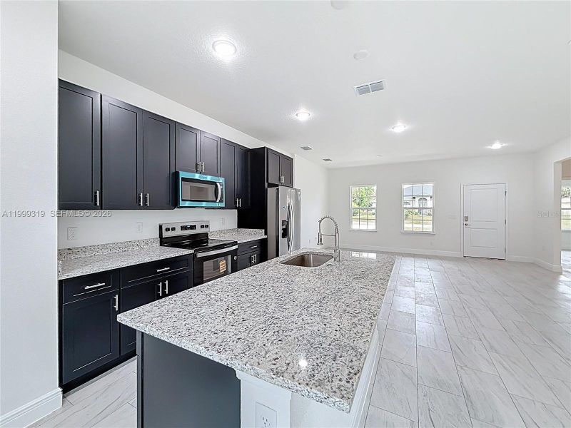 Furnished interior view inside a new home in , Ocala (Image 3).