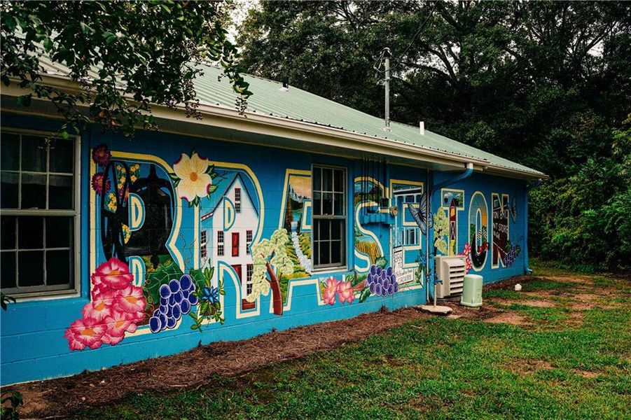 Front exterior of a new home in Rosewood Lake Estates, Hoschton, GA, highlighting curb appeal (Image 46).