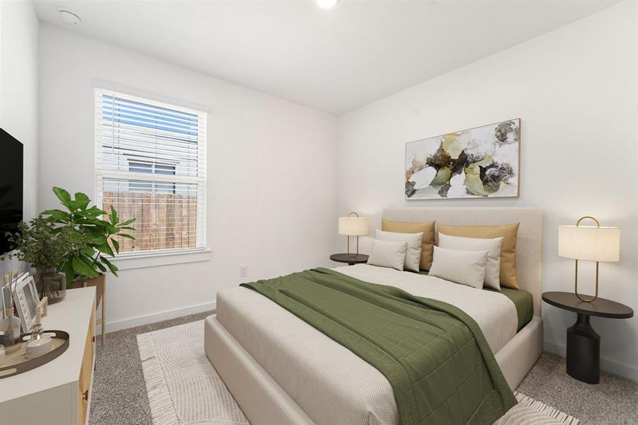 Secondary bedroom features plush carpet, recessed lighting, large window with privacy blinds and a spacious closet.