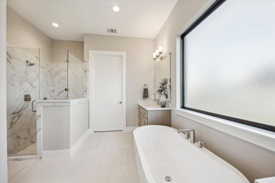 Soaking bathtub and walk-in shower. Soaking bathtub and walk-in shower.