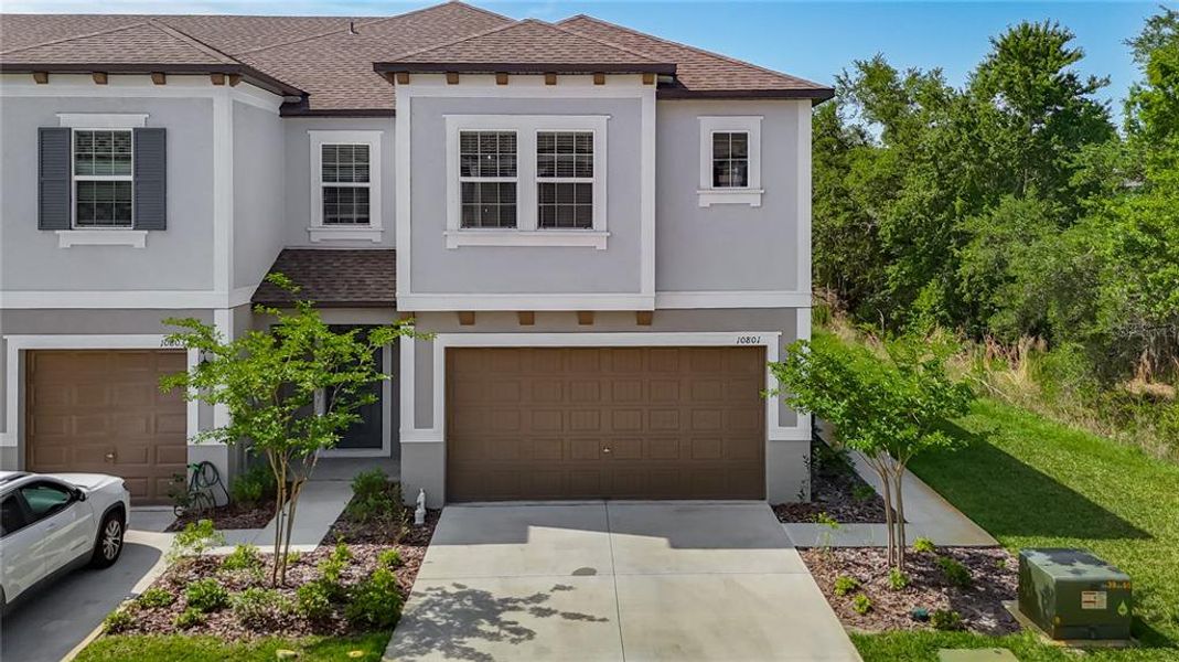 Front exterior of a new home in , Tampa, FL, highlighting curb appeal (Image 24).