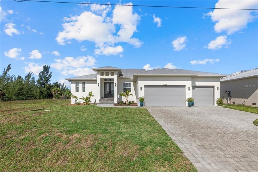 Front exterior of a new home in , Port Charlotte, FL, highlighting curb appeal (Image 21).
