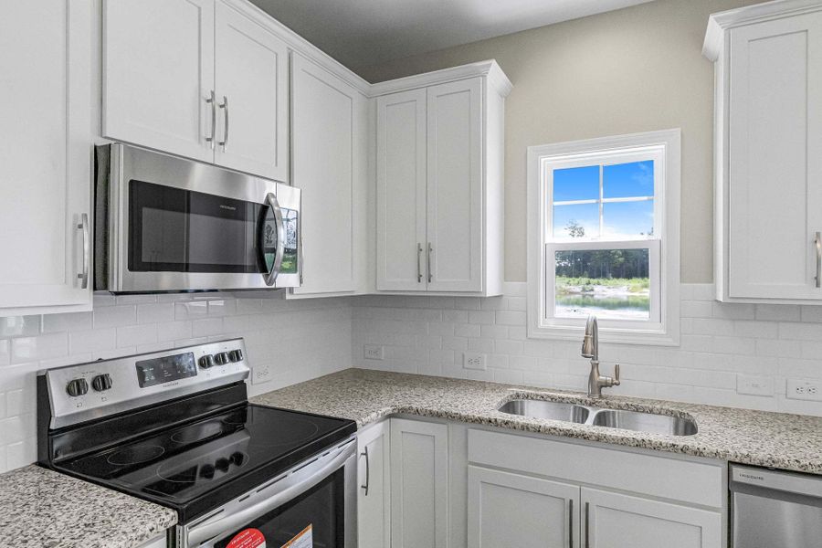Representative furnished interior of a home built from the Magnolia by Caviness & Cates Communities in Bartlett Manor, Youngsville (Image 182).