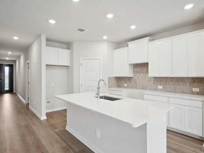 Kitchen in the Briscoe floorplan at a Meritage Homes community. Kitchen in the Briscoe floorplan at a Meritage Homes community.