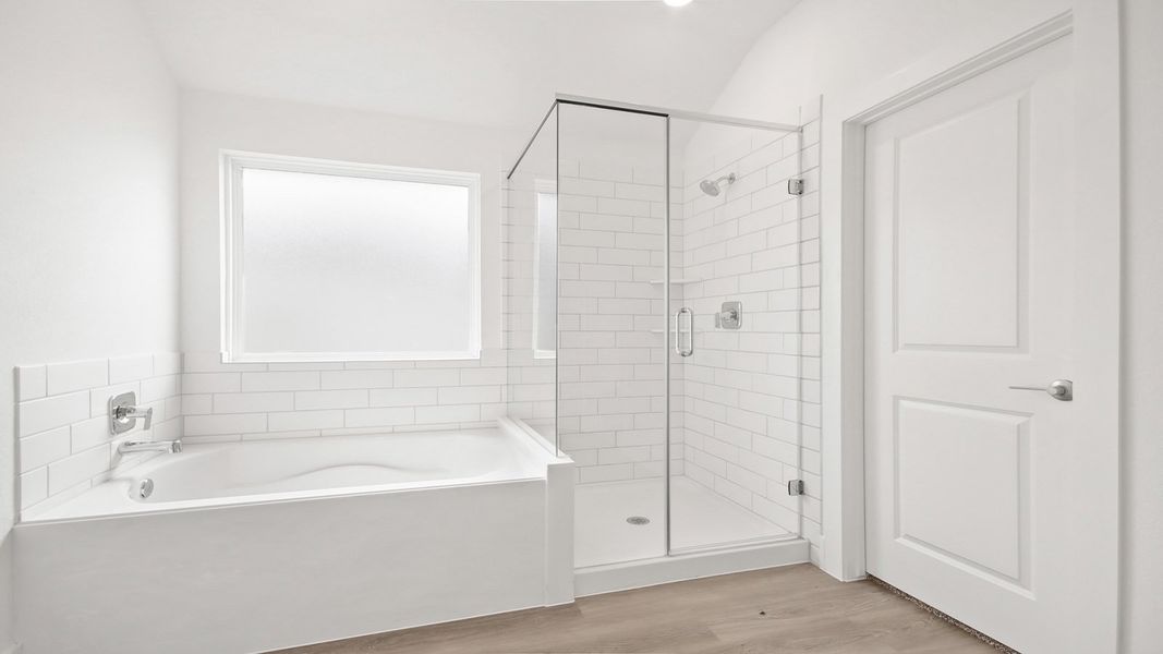 Representative furnished interior of a home built from the E60A by D.R. Horton in Riverside Estates, Mont Belvieu (Image 8).