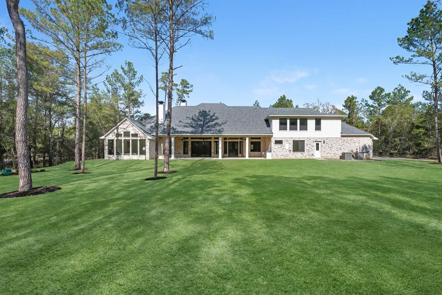 This backyard is perfect for family gatherings, social events, or simply unwinding in the fresh air. This backyard is perfect for family gatherings, social events, or simply unwinding in the fresh air.