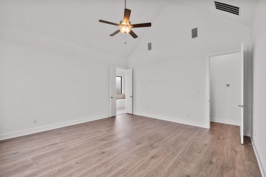 Primary Bedroom with elevated ceiling