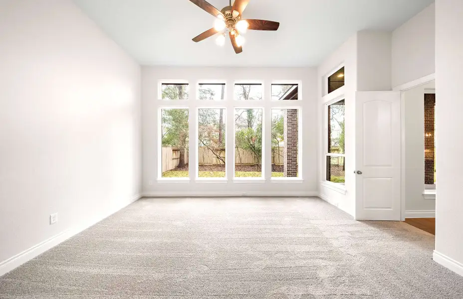 Representative unfurnished interior of a home built from the 3068 by Ravenna Homes in The Woodlands Hills 65′, Willis (Image 39).