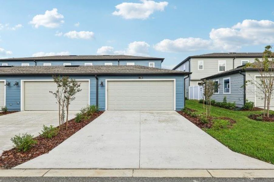 Exterior details and patio area of a home in Northlake Townhomes, Winter Garden (Image 23). Exterior details and patio area of a home in Northlake Townhomes, Winter Garden (Image 23).
