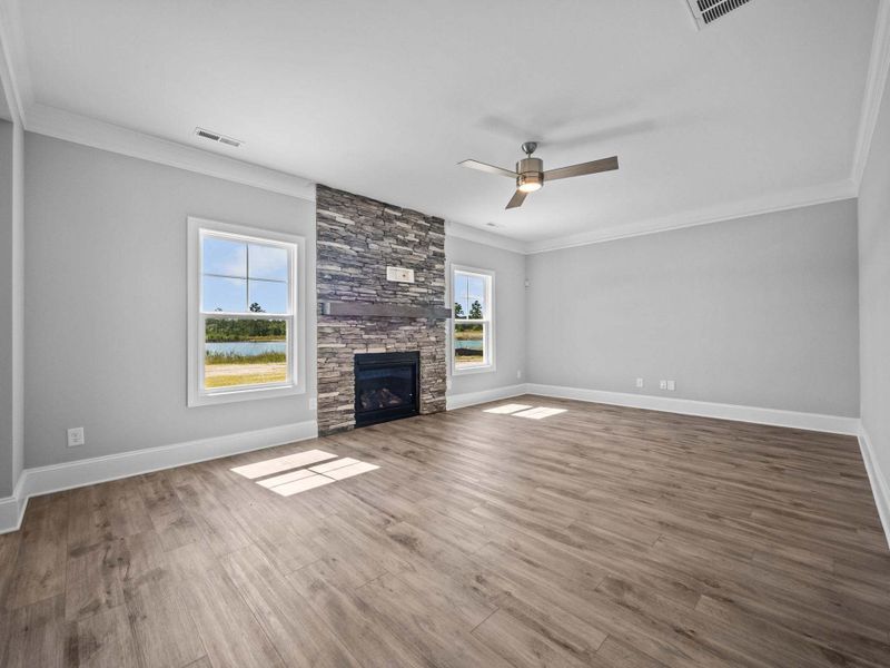 Great Room with Fireplace with Stone Surround Option Great Room with Fireplace with Stone Surround Option