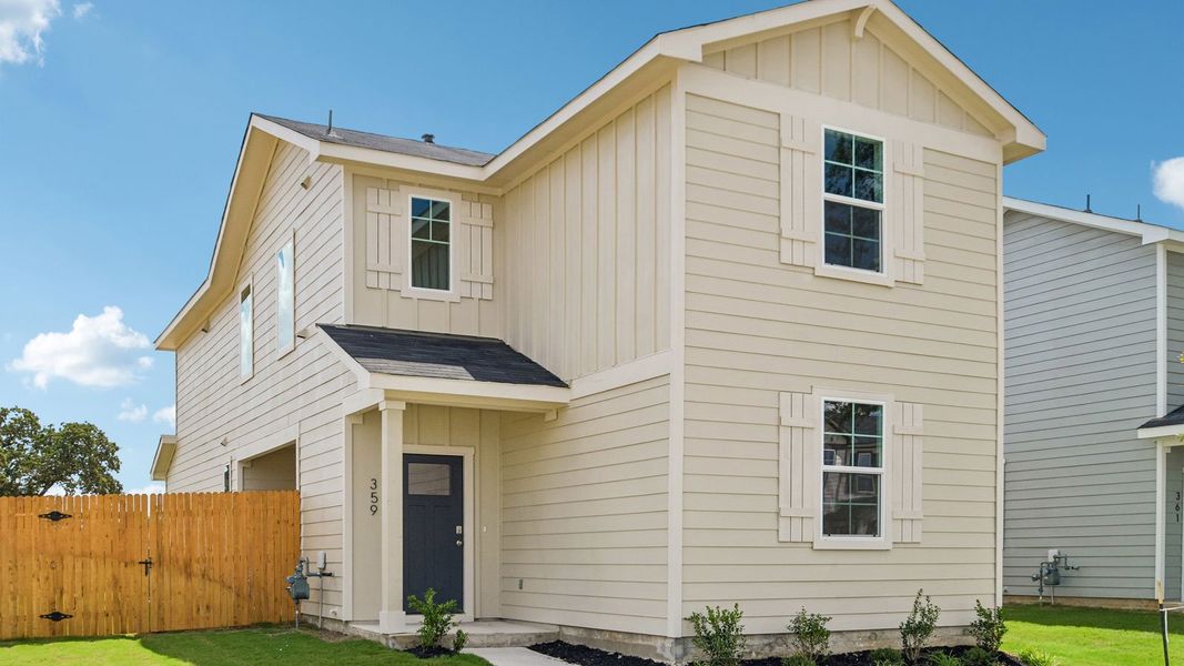 Front exterior of a new home in Valverde, Bastrop, TX, highlighting curb appeal (Image 2). Front exterior of a new home in Valverde, Bastrop, TX, highlighting curb appeal (Image 2).