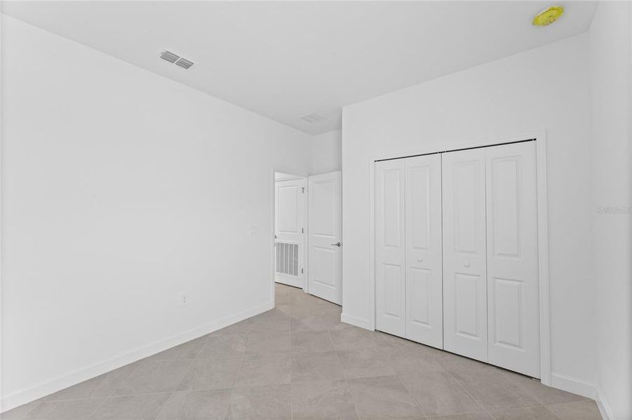 Spacious, unfurnished interior of a new home in Calusa Country Club, Lakewood Ranch (Image 28). Spacious, unfurnished interior of a new home in Calusa Country Club, Lakewood Ranch (Image 28).