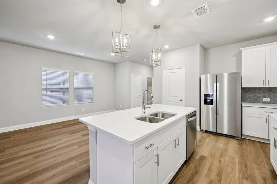 Furnished interior view inside a new home in Parks at Foster Crossing - Spring Series, Anna (Image 8).