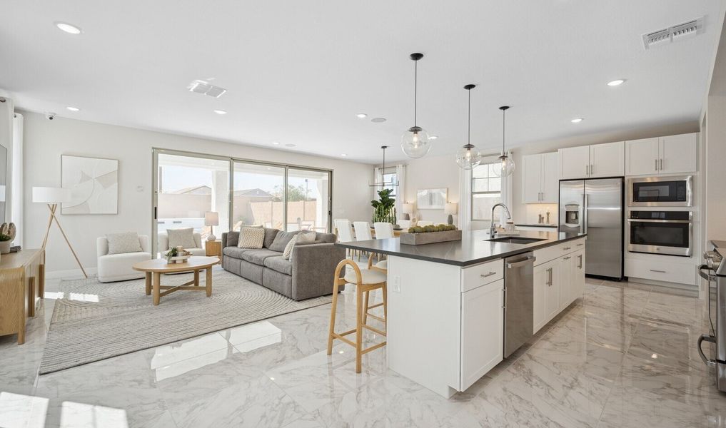 Bright and open great room with luxurious tile flooring