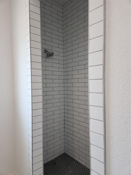 Left Side of Walk-in Master Shower. Shower Head 2 and Interior details with tiled shower