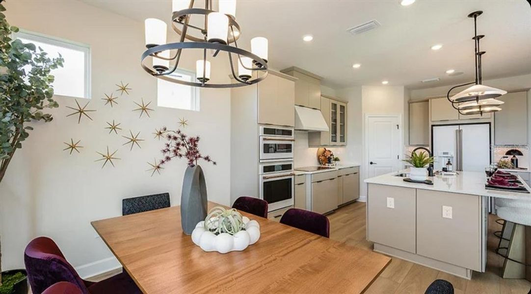 Furnished interior view inside a new home in Esplanade at Wellen Park, Englewood (Image 5).