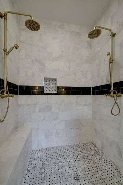 Walk-in shower with double showerheads*photos are of a previously constructed home by the builder. 1406 Thornton may have different selections at builders sole discretion. These photos are not meant to be an exact representation of 1406 Thornton.