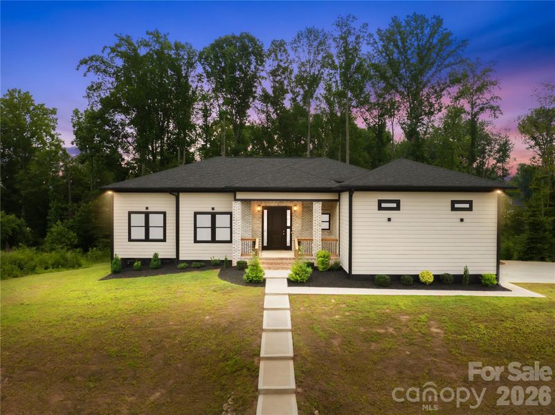 Exterior details and patio area of a home in , Bessemer City (Image 26).