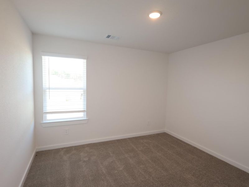 Spacious, unfurnished interior of a new home in Sorella, Tomball (Image 12).