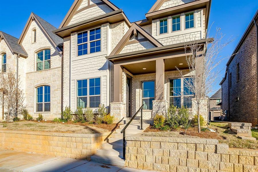 Front exterior of a new home in Knight's Landing on Eden Road, Arlington, TX, highlighting curb appeal (Image 18).