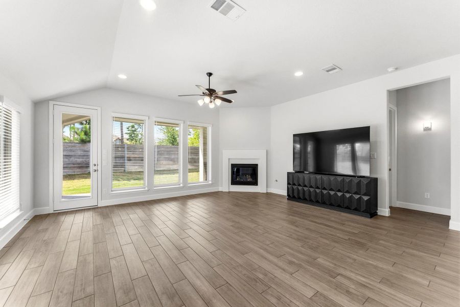 Spacious Living Area, Corner Gas Log Fireplace w/Remote, Light and Bright, Ceiling Fan and Tile Flooring Spacious Living Area, Corner Gas Log Fireplace w/Remote, Light and Bright, Ceiling Fan and Tile Flooring